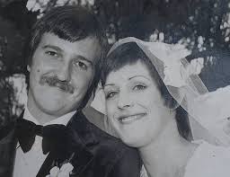 Can I ask if you wonderful people can bring this photo of me and my then  fiancé now husband. Found it when moving and would love for it to be made  clearer