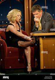 Actress Christina Applegate, left, shows host Craig Ferguson her tattoo  during a segment of 'The Late Late Show with Craig Ferguson' at CBS  Television City on April 10, 2008 in Los Angeles,