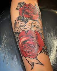 For a truly striking design, have the tattoo artist create the rose and then use a scripted version of your chosen person's name in lieu of a traditional stem. 22 Beautiful Roses With Names Tattoo Ideas For Women Saved Tattoo