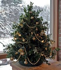 Plug your christmas lights into an outlet. Home Decorating Small Christmas Tree On The Table Interior Design Ideas Ofdesign
