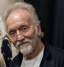 So he sends her a letter, but than finds out that he was wrong. Tobin Bell Wikipedia