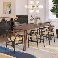 It is a duncan phyfe pedestal table that has two oversized leaves and birdcage pedestals and outswept legs. Maarten Large Dining Table