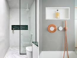 The smaller mosaic tiles in the niche echo the larger rectangles outside, while intersecting with the vertical accents. 9 Shower Niche Ideas To Create The Perfect Bathroom