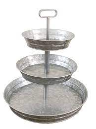 This cake stand has two levels with a sturdy galvanized metal frame that has raw welding accents for a touch of rustic style. 3 Tier Galvanized Metal Stand Large Twin Handle Farmhouse Style Serving Tray Perfect For Rustic Vintage Decoration In Kitchen And Dining Room Buy Online In Bosnia And Herzegovina At Bosnia Desertcart Com Productid