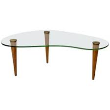 The glass top rests atop the poles, exuding an almost floating quality. Floating Coffee Tables 55 For Sale On 1stdibs