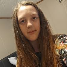 I'd appreciate any suggestions for an indoor plant that grows well in an  area that doesn't have too much natural light. It's quite a large room with  a window at one end.