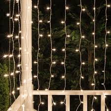 Kringle Traditions 5 4ft X 5 5ft Curtain Lights End To End Connectible White Wire Christmas String Lights Indoor Outdoor Decorations For Wedding Party Bedroom Lights Walmart Com Walmart Com