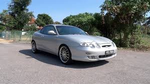 Image result for Bright Silver 2000 Tiburon