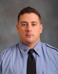 When we pulled up, there was a person out front pointing to the second  floor window. I looked up and saw someone trying to escape the fire. There  was a lot of