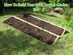 How To Build Your Own Terrace Garden Bed Living Green And Frugally Http Www Livinggreenandfrugally C Diy Terrace Garden Terrace Garden Hillside Garden
