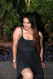 Check out actress ashwini exclusive . Hd Photos Ashwini In Black Mini Dress