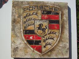 The porsche logo symbolizes a crest of stuttgart. Porsche Emblem Braun Classicpainting