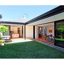 L Shaped Extension Lets The Light Shine In Homes To Love L Shaped House House Extension Design Modern House Exterior