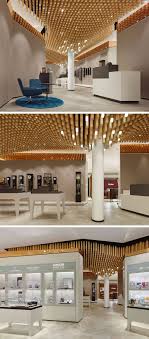 Modern Ceiling Design Idea 4362 Square Wooden Dowels Cover The Ceiling Of This Watch Showroom False Ceiling Design False Ceiling Ceiling Design
