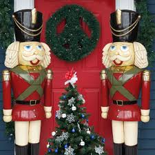 Outdoor christmas decor / large topiary and large gift box idea. Heinimex Life Sized Nutcracker 6ft Tall
