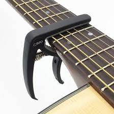 Clean with a damp cloth. Gitaar Capo Voor 6 Snaren Tuning Klem Slozz Zwart Guitar Tuning Electric Guitar Tuner Guitar Capo