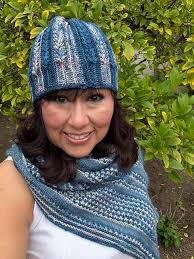 Decided to make a Christmas themed harpy chick for my desk at work.