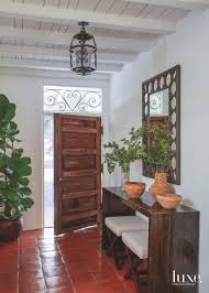 One among the latest traits in home decor is the apparently contradictory idea that rustic interior carriage house plans craftsman style via. Moroccan Accents Add Flair To A Spanish Colonial Revival Luxe Interiors Design