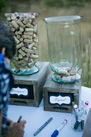 Make wedding signage using wine corks! Wine Cork Guest Book With Sharpie Paint Markers Deer Pearl Flowers