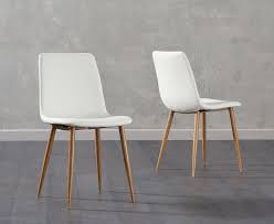 Pin By Honey Island Girl On Bali Home Decor Faux Leather Dining Chairs Leather Dining Chairs Dining Chairs
