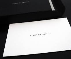 Business people in urban outdoor activity. Stop Talking Cards