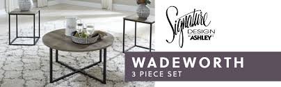 Comprised of one rectangular coffee table and two matching square end tables, the pieces feature lower storage shelves for household organization. Amazon Com Signature Design By Ashley Wadeworth Urban Wood Grain 3 Piece Table Set Includes 1 Coffee Table And 2 End Tables Brown Black Furniture Decor