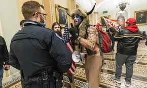 A third individual, a known qanon supporter, was also identified. First Thing Capitol Rioters Intended To Capture And Assassinate Lawmakers Us News The Guardian