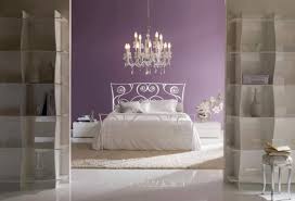 Ranging from simple tall bars to incredibly detailed wrought iron is often associated with large estates, manors, and high end government buildings. Wonderful Bedroom Decorating Ideas With White Bontempi Macrame Wrought Iron Bed In Purple Bedroom And Classic Chandelier Design Ideas Primadr Uploaded By Ellenfiena