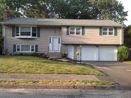 Which house has more curb appeal? Raised Ranch Facelift