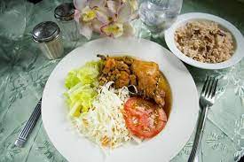 Traditional Sunday Dinner In Jamaica Rice And Peas With Chicken Cooked In Your Favourite Way Jamaican Recipes Caribbean Recipes International Recipes
