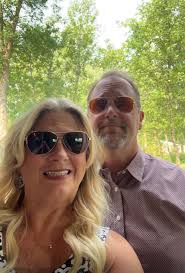 We enjoyed a lovely evening at Gretchen Stenehjem's residence, featuring a  stunning view, steaks from Spanky's, and a fundraiser for the Anne Carlson  Center.