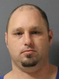 Man arrested after allegedly choking female