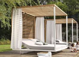 Garden daybed with coffee table brown sylt lux. Tribu Pavilion Garden Daybed In Teak Tribu Outdoor Furniture