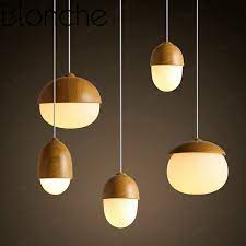 Also be sure that the pendant is at least 12 inches smaller than the width of the table. Nordic Wooden Pendant Lamp Frosted Glass Hanging Lights For Living Room Modern Home Dining Room Kitchen Cafe E27 Light Fixtures Pendant Lights Aliexpress