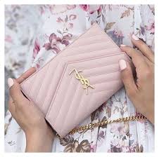 twirling in zurich pink ysl bag pinkyslbag zurich a city where there is no eiffel tower big ben colosseo berlin wall in 2021 bags ysl bag purses and handbags