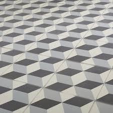 This natural stone pebble tile in black/white offers a higher quality, durable design in an array of blended shades and colors. Hydrolic Black White Matt 3d Concrete Effect Porcelain Wall Floor Tile Pack Of 25 L 200mm W 200mm Diy At B Q