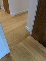 The best direction to lay hardwood flooring. Change In Direction Of Wood Flooring Boards Wood Floor Installation Installing Hardwood Floors Wood Floor Design