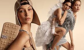 She completed her look with a dv1 black leather bag. Kendall Jenner Stars In New Burberry Campaign With Gigi And Bella Hadid Daily Mail Online