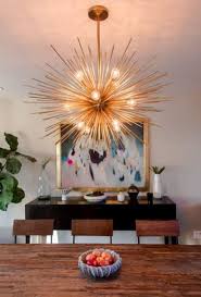 Is This The Coolest New Light Fixture Celestial Light Fixtures Studio 52 Interiors Dining Lighting Mid Century Modern Dining Room Mid Century Dining Room