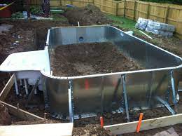 Semi inground pool installation and back yard landscaping project. Pool Kits Swimming Pool Kits Inground Pool Kits Pool Warehouse Swimming Pool Kits Pool Kits Swimming Pools Backyard