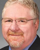 Former senator wins grant for road work