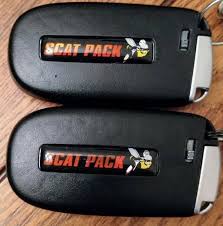 Dodge transponder and remote car keys, also known as key fobs, smart keys or push to start keys, are the latest generation of security car keys. Scat Pack Challenger Charger Key Fob Badges In Red Set Of 2 Etsy