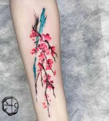 Cherry Blossoms Tattoo Thigh Google Search Cherry Blossom Tattoo Butterfly Tattoo On Shoulder Leg Tattoos