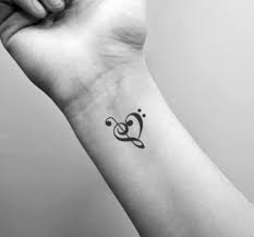 A bird, a peace sign, and a question mark. 20 Interesting Music Tattoo Ideas You Ll Love Headphonesproreview