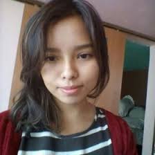 Caroline Mora (123y123)