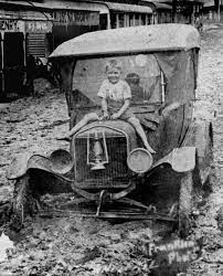 Boy Sitting On The Bonnet Of A Car Bogged In Mud From The 1925 Flood At Innisfail Queensland Stuck In The Mud Vintage Cars Old Photos