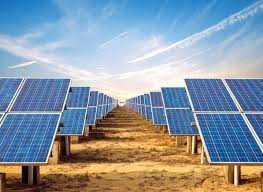 Narrow Gap Looking Into The Distance Of A Giant Solar Farm Against A Blue Sky Solar Panels Solar Farm Solar Energy
