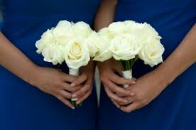 Maybe you would like to learn more about one of these? Bridesmaids In Blue Dresses Holding A White Rose Wedding Bouquet Stock Photo Picture And Royalty Free Image Image 15285746