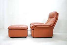 The beautiful distressed patina to the leather of this well loved chair was achieved by many years of enjoyment. Vintage Ds 49 Cognac Leather Lounge Chair Ottoman From De Sede For Sale At Pamono