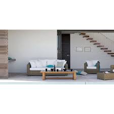 Teak is a natural material that develops a seasoned character as it lives out. Rectangular Outdoor Coffee Table Siena By Manutti